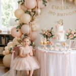 Elegant ballerina third birthday party setup for a girl at home