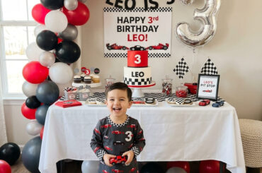 Modern race car third birthday party setup for a boy at home