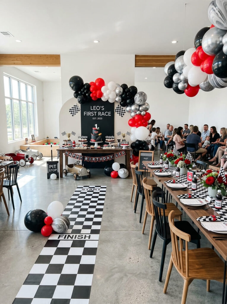 Full cars first birthday setup with coordinated race-themed decor